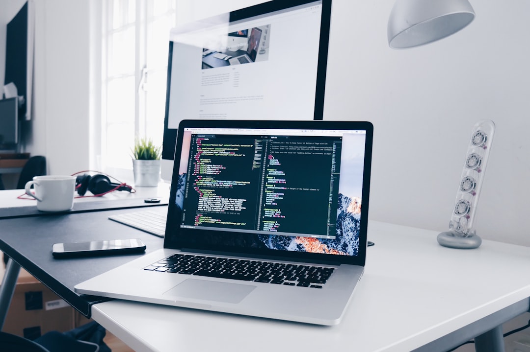 Developer coding workspace with multiple monitors